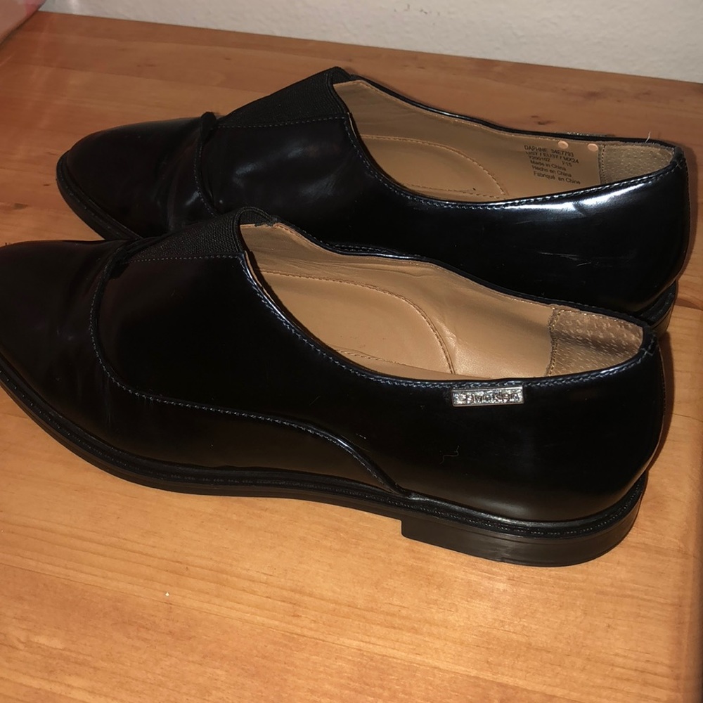 Metallic blue women’s loafers